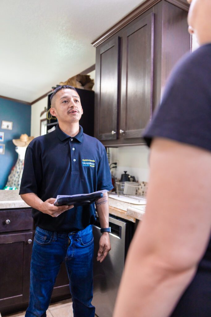 Appliance Repair Technician Discussing costs