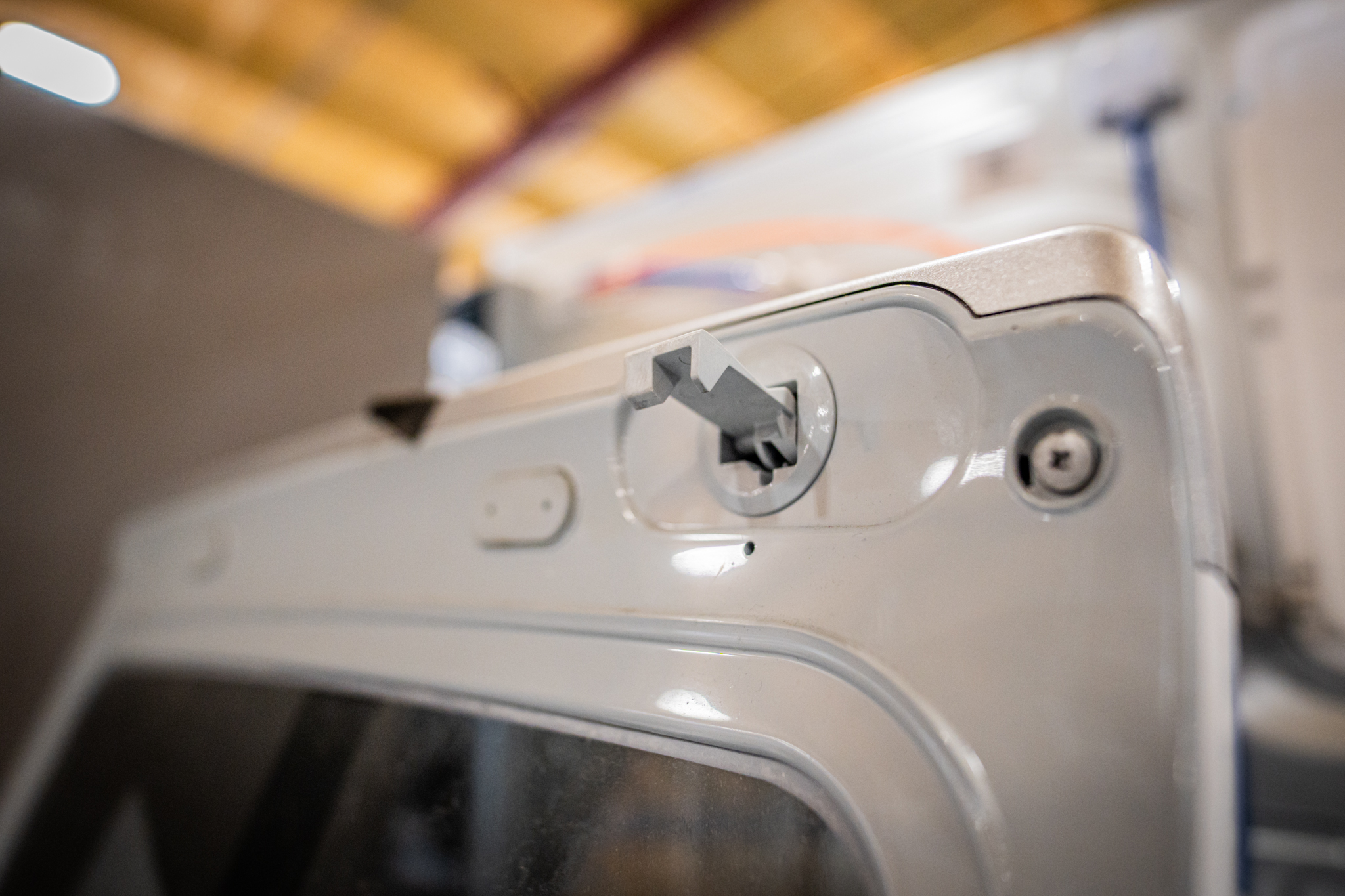 A close-up of a GE washer's control panel, showing the settings.